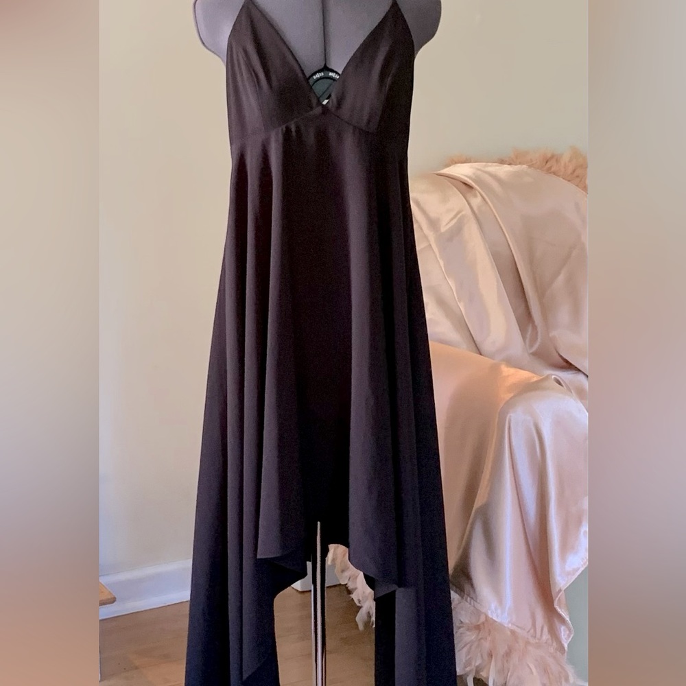 Like new Halston Asymmetrical halter dress. Back hook and eye closure